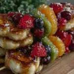 fluffy dr seuss rainbow fruity pancake kabobs - featured image