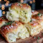 fluffy homemade dinner rolls with garlic herb butter - featured image