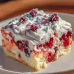 red white and blue layered jello poke cake - featured image